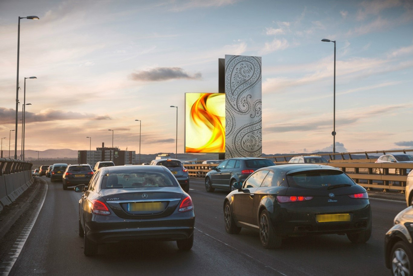 Work to build Scotland's tallest advertising tower on the side of its busiest motorway is underway.